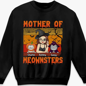 T-shirt, sweat à capuche et sweat-shirt unisexe personnalisé « Mother Of Meownsters » avec chat ; cadeau d'Halloween pour les propriétaires et les amoureux des animaux.