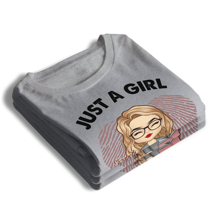 Une fille qui aime les livres - T-shirt et sweat à capuche unisexe personnalisé